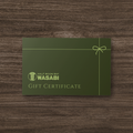 Green gift certificate for Half Moon Bay Wasabi on a wooden surface